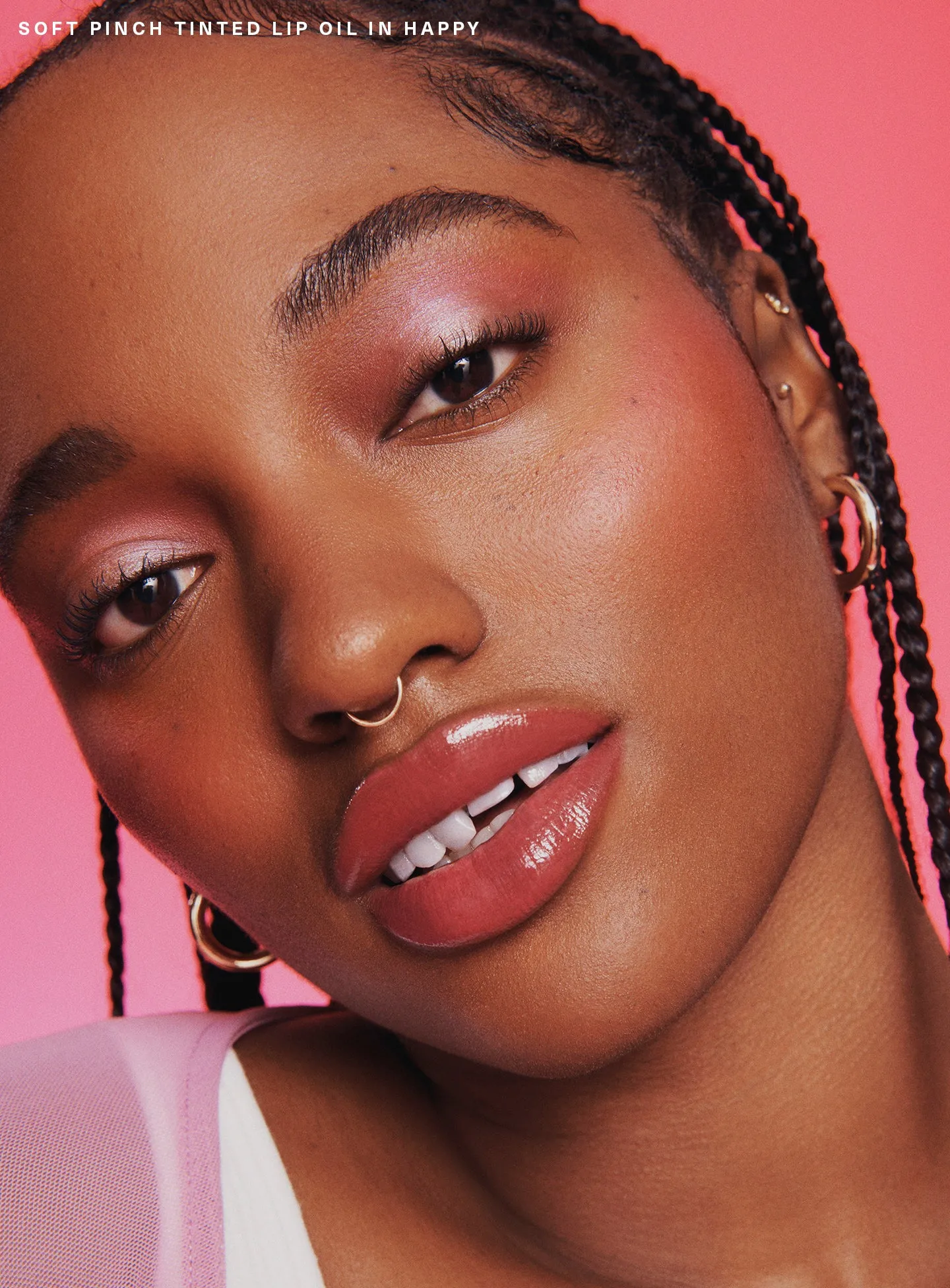 soft-pinch-tinted-lip-oil-on-figure-happy-03-1440x1952-1.webp